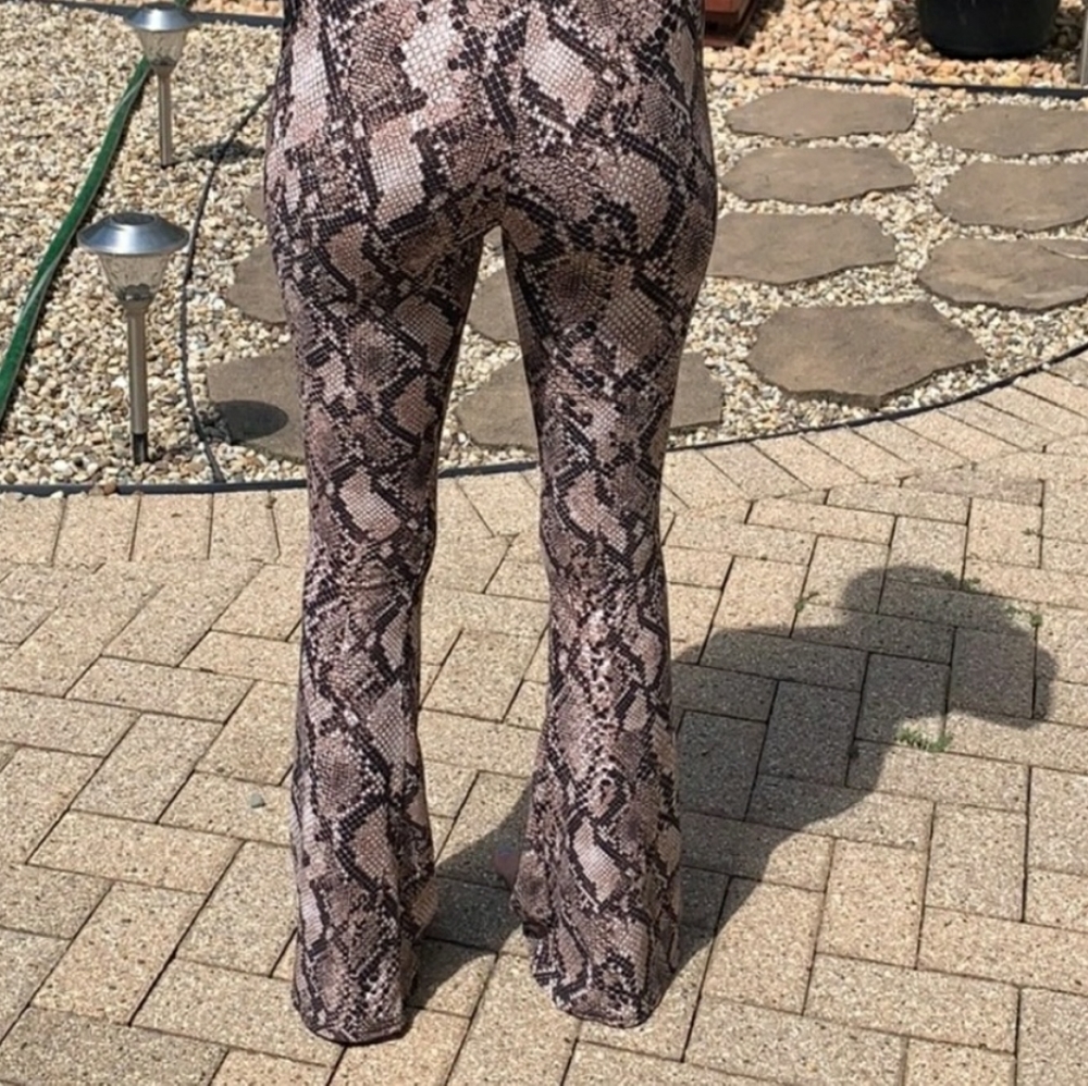 Snake patterned leggings (flare at bottom)